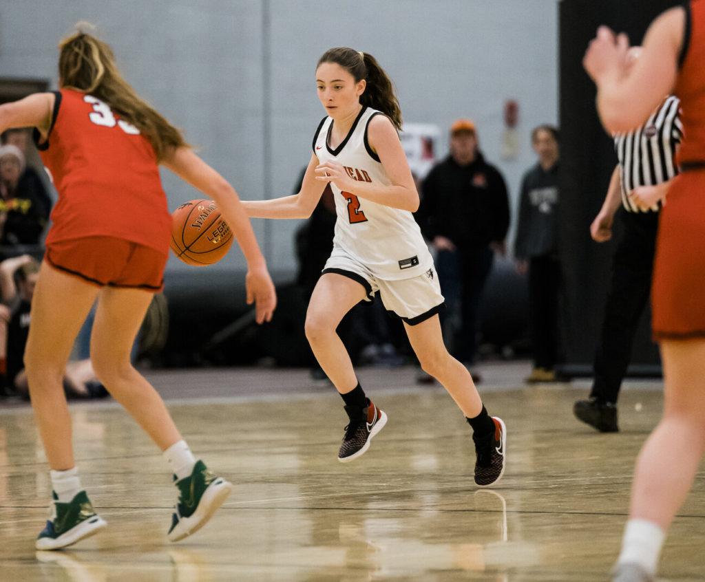 Marblehead's Marrietta O'Connell drives the ball down court.